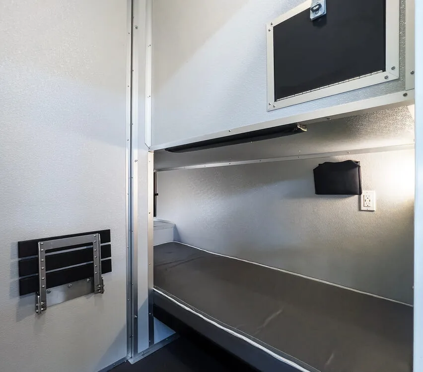 Lower bunk in an individual cabin.