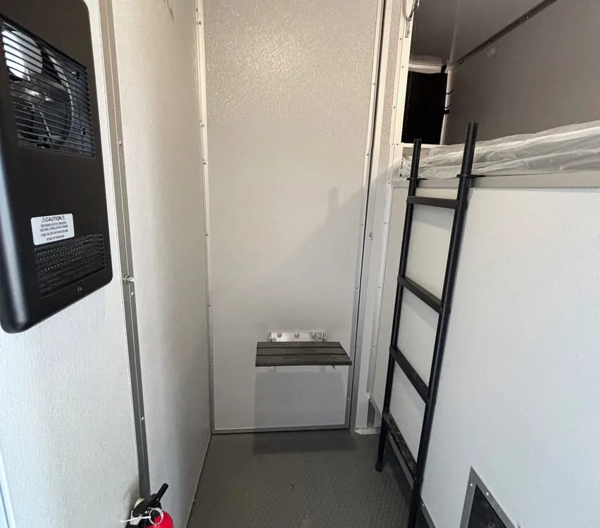 Upper bunk and ladder.
