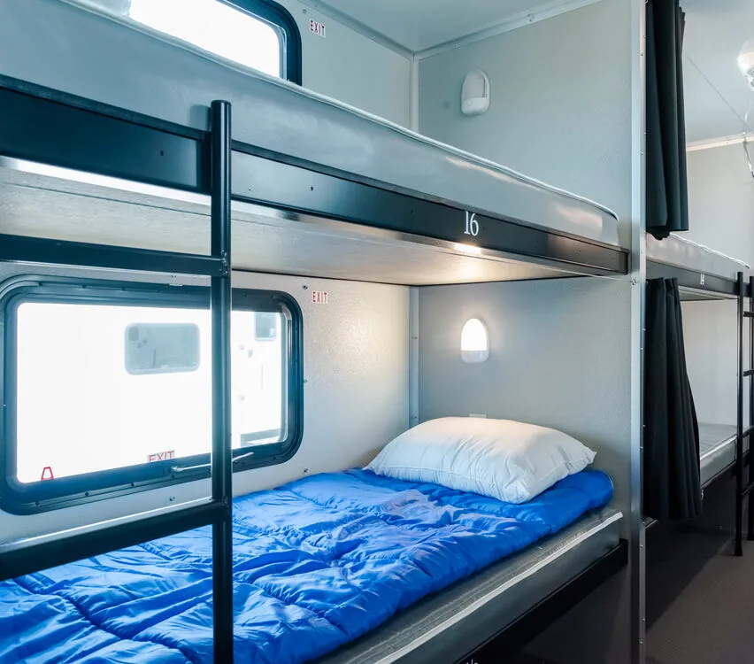 Lower bunk with storage below.
