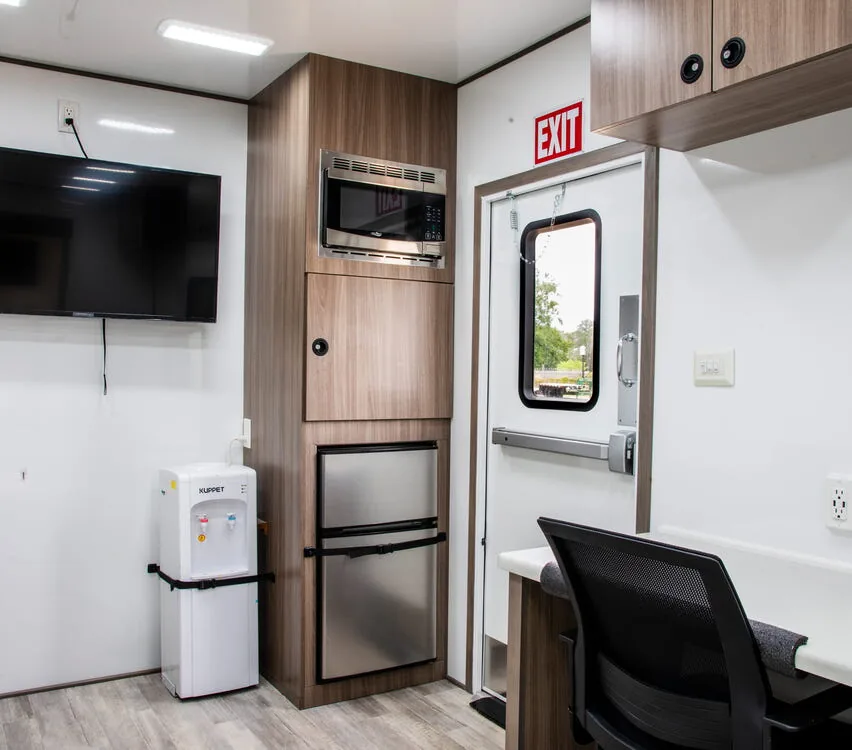 Video monitor, microwave and refrigerator.