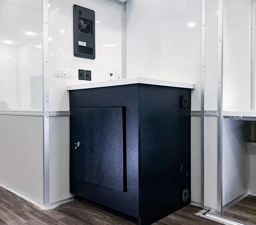 Cabinet with refrigerator and microwave.