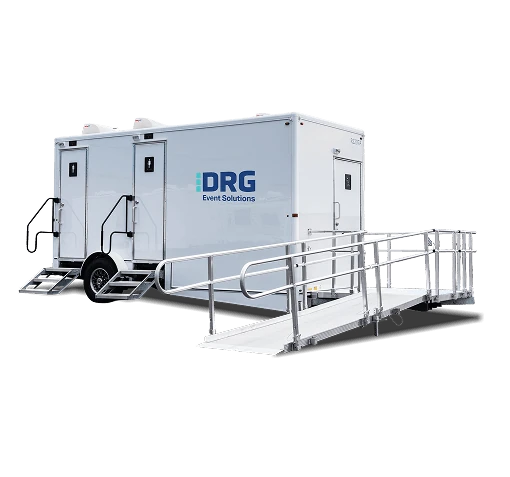 White DRG ADA and 2-stall restroom trailer with an access ramp.