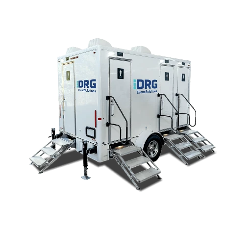White DRG 4-stall restroom trailer with two sets of stairs.
