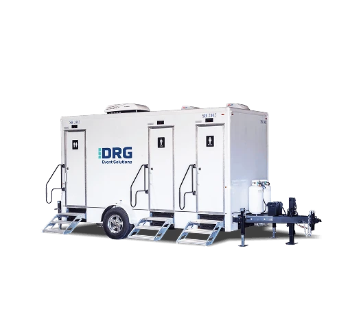 White DRG 3-stall shower trailer with stairs.